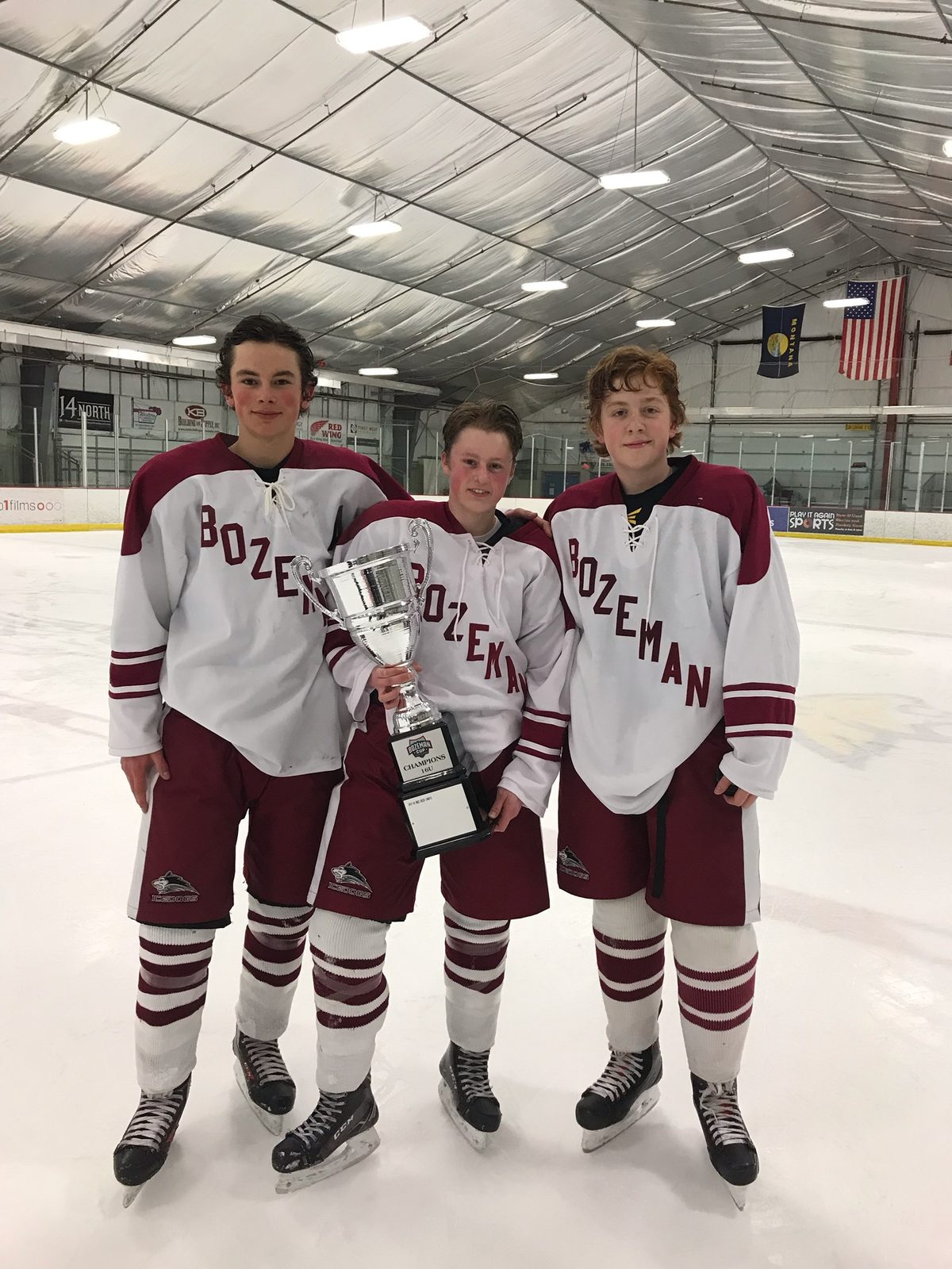 Blake and Seth Miessner with the Bozeman Cup championship trophy